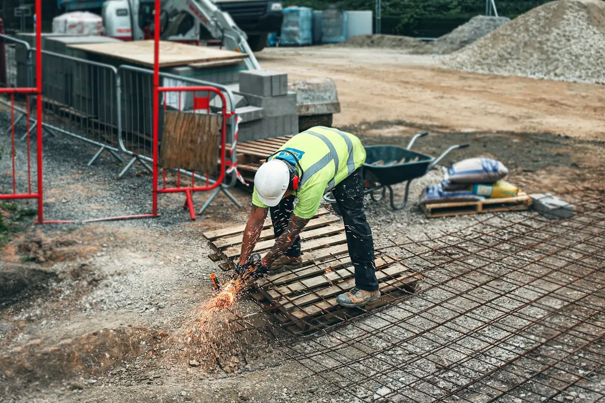 Worker in safety gear on a job site