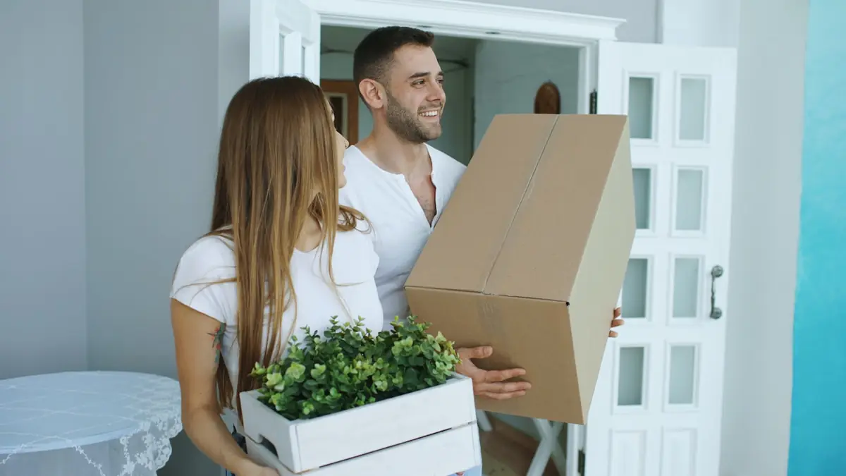 Couple with keys to a new home